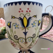 Kubek ceramiczny Bell dekoracja Tulipan kaszubska ceramika ręcznie zdobiona Arbata kubek tulipan wzór kaszubski rękodzieło metoda stempelka