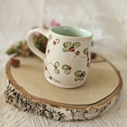 Kubek ceramiczny kwiaty czerwone dość ciężki rękodzieło ręcznie toczony i malowany