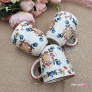 Kubek ceramiczny Bell dekoracja Wdzydzka kaszubska ceramika ręcznie zdobiona Arbata kubek wdzydzki wzór kaszubski rękodzieło metoda stempelka