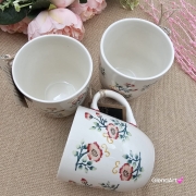 Kubek ceramiczny Bell dekoracja Róże kaszubska ceramika ręcznie zdobiona Arbata kubek róże wzór kaszubski rękodzieło metoda stempelka róże na kubku