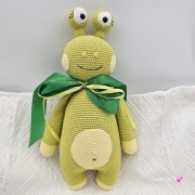 Zielony potworek na szydełku jaskrawy zielony potwór duże oczy rękodzieło na szydełku