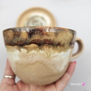 Filiżanka ceramiczna jamnik z czarnym jamniczkiem uroczym ręcznie toczona i malowana filiżanka ze spodkiem przenikające się szkliwa 300 ml z jamnikiem kubek