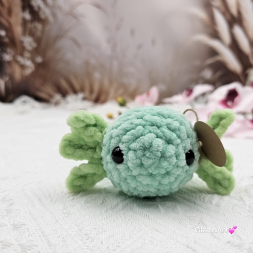 Axolotl seledynowy na szydełku urocza salamandra na szydełku rękodzieło na szydełku polski produkt szydełkowa praca seledynowy i zielony kolor