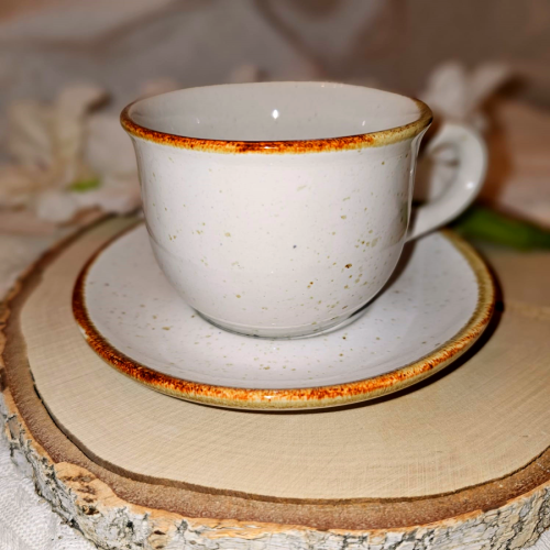 Filiżanka ceramiczna ze spodkiem nakrapiana Trio RUSTIC Krem Kera nakrapiana